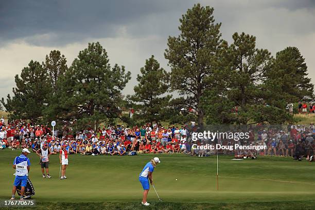 Caroline Hedwall of Sweden and the European Team chips onto the 16th green as she went on to win the hole and bring her match with Michelle Wie of...