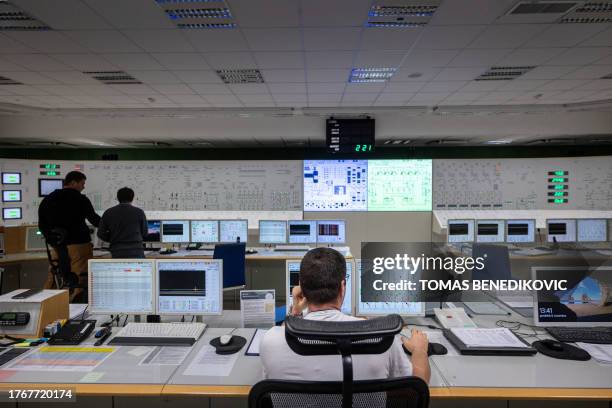Operators check the control panels at the control room of the third unit of the Mochovce Nuclear Power Plant, located between the towns of Nitra and...