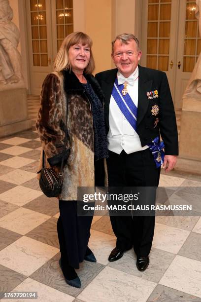 Denmark's Foreign Minister Lars Loekke Rasmussen and Solrun Jakupsdottir Rasmussen arrive for a State Banquet at Christiansborg Castle in Copenhagen...