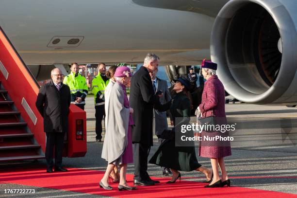 Crown Princess Mary of Denmark is curtsying to King Felipe VI of Spain at the airport in Copenhagen, Denmark, on November 6, 2023.