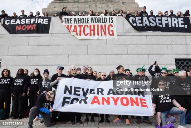 Activists from Jewish Voice for Peace occupy the pedestal of the Statue of Liberty on November 6, 2023 in New York City. The group has been occupying...