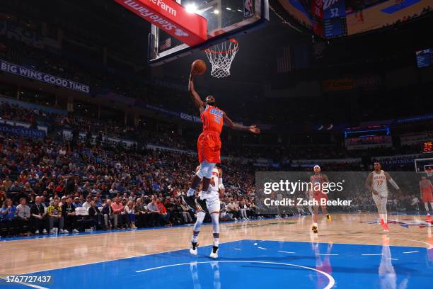 Cason Wallace of the Oklahoma City Thunder drives to the basket during the game against the Atlanta Hawks on November 6, 2023 at Paycom Arena in...