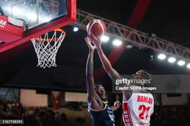 Olivier Hanlan of Pallacanestro Varese OpenJobMetis competes for the ball against Stephane Gombauld of Dinamo Sassari Banco di Sardegna during LBA...