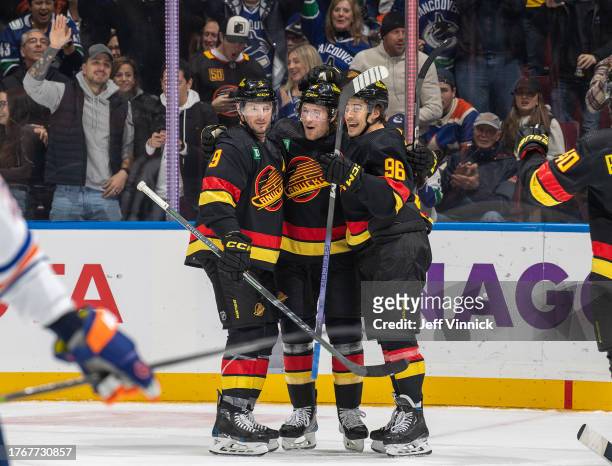 Brock Boeser of the Vancouver Canucks celebrates his goal with teammates during the first period of their NHL game against the Edmonton Oilers at...