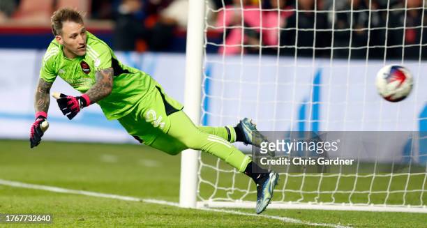Steve Clark of the Houston Dynamo can't stop an overtime penalty kick by Cristian Arango of Real Salt Lake during their MLS Cup Western conference...