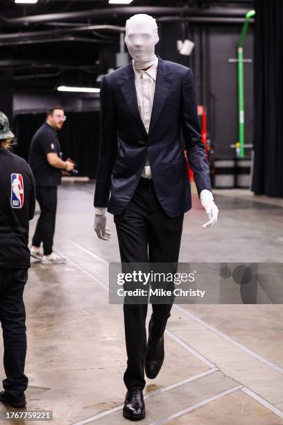 Victor Wembanyama of the San Antonio Spurs arrives in a Slenderman costume before an NBA game against the Phoenix Suns at Footprint Center on October...