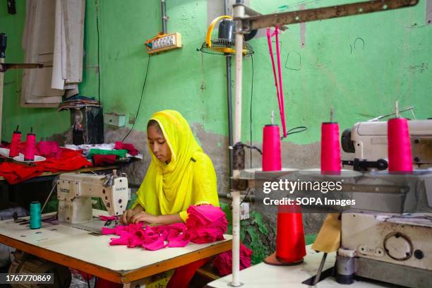 Child seen working at a local ready-made garment factory. Child labor is restricted in ready-made garment sectors. However, there are still children...