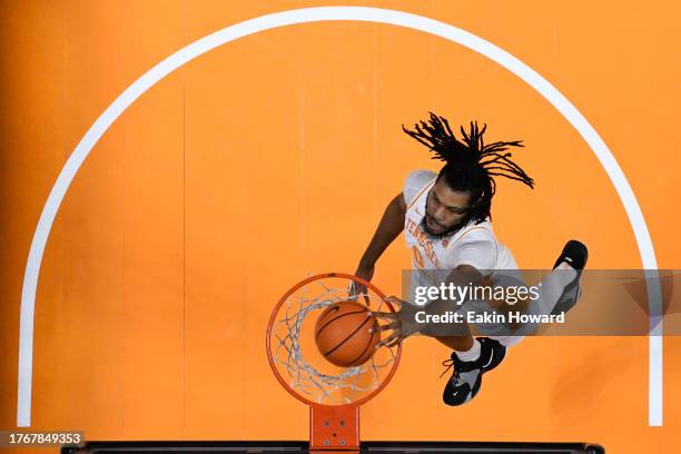 Jonas Aidoo of the Tennessee Volunteers dunks during the second half against the Lenoir-Rhyne Bears at Thompson-Boling Arena on October 31, 2023 in...