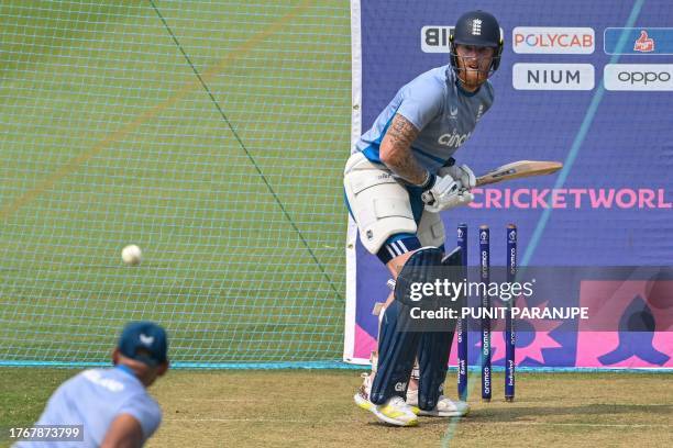 England's Ben Stokes bats at the nets during a training session on the eve of their 2023 ICC Men's Cricket World Cup one-day international match...