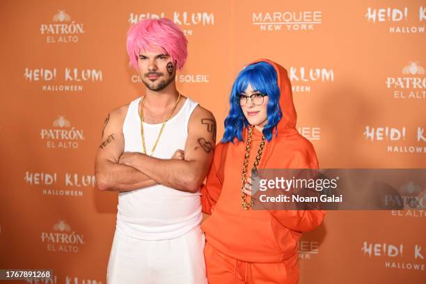 Taylor Lautner and Taylor Dome attend Heidi Klum's 22nd Annual Halloween Party presented by Patron El Alto at Marquee on October 31, 2023 in New York...