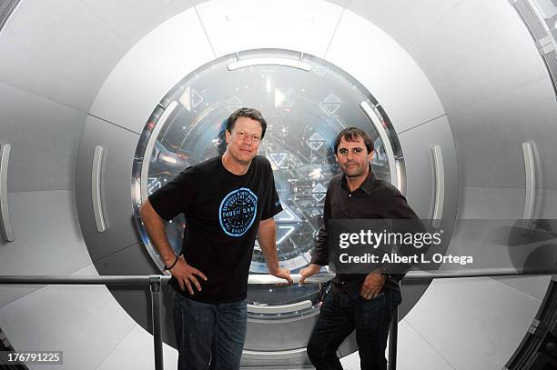 Director Gavin Hood and producer Roberto Orci attend the "Ender's Game" Experience Press Preview Night held at Martin Luther King Jr. Park on...