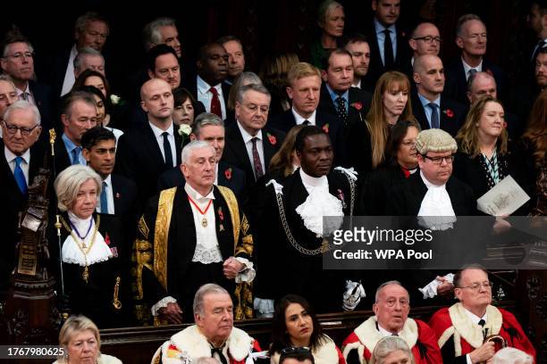 Black Rod Sarah Clarke and Speaker of The House of Commons Sir Lindsay Hoyle, stand in front of politicians including Prime Minister Rishi Sunak and...