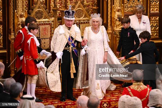 King Charles III and Queen Camilla prepare to depart following the State Opening of Parliament in the House of Lords Chamber, on November 7, 2023 in...