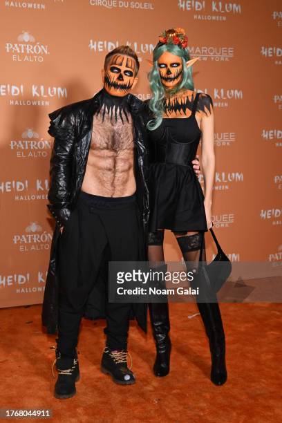 Andrej Rusakov and Katrina Rusakova attend Heidi Klum's 22nd Annual Halloween Party presented by Patron El Alto at Marquee on October 31, 2023 in New...