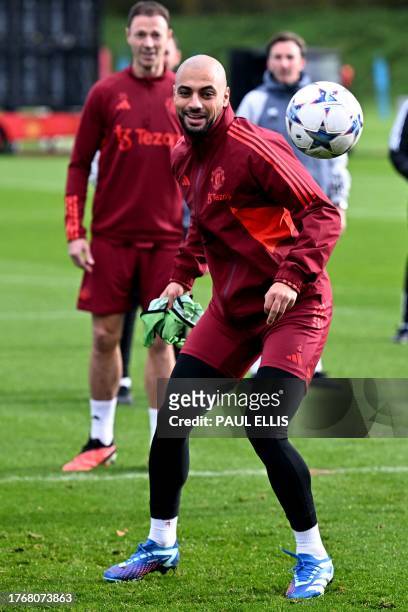 Manchester United's Moroccan midfielder Sofyan Amrabat attends a training session at the Carrington Training Complex in Manchester, north-west...