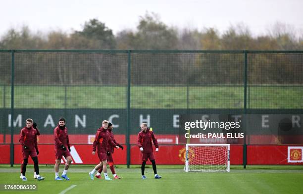 Manchester United's players take part in a training session at the Carrington Training Complex in Manchester, north-west England on November 7, 2023...