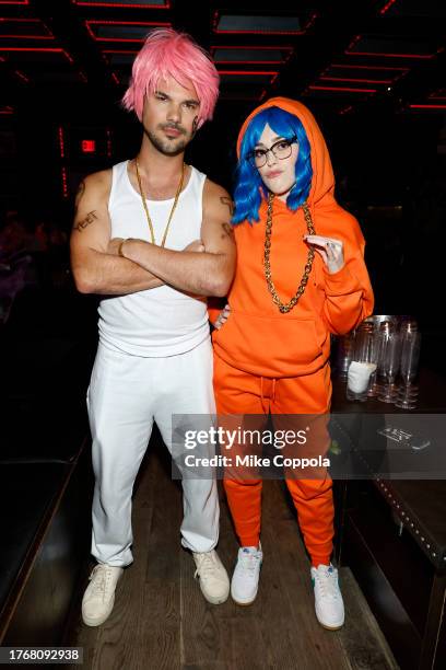Taylor Lautner and Taylor Dome attend Heidi Klum's 22nd Annual Halloween Party presented by Patron El Alto at Marquee on October 31, 2023 in New York...