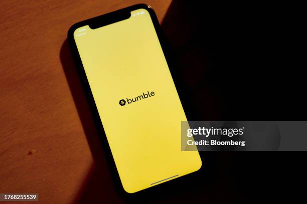 The Bumble logo on a smartphone arranged in New York, US, on Monday, Nov. 6, 2023. Bumble Inc. Released earnings figures on November 7. Photographer:...