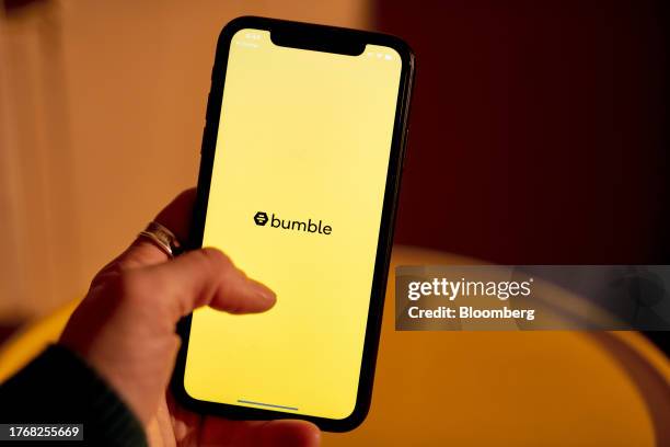 The Bumble logo on a smartphone arranged in New York, US, on Monday, Nov. 6, 2023. Bumble Inc. Released earnings figures on November 7. Photographer:...