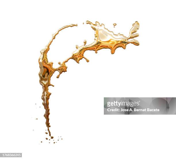 splashes and drops of gold colored liquid on a white background. - olive oil splash stock pictures, royalty-free photos & images