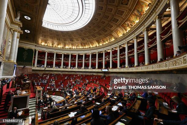 Photograph shows a general view of the French National Assembly in Paris on November 7 during a session of questions to the government.