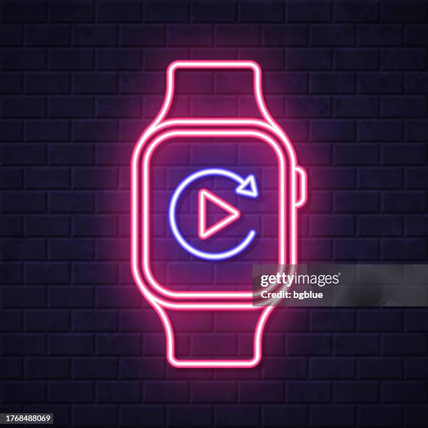 replay on smartwatch. glowing neon icon on brick wall background - replay vector stock illustrations
