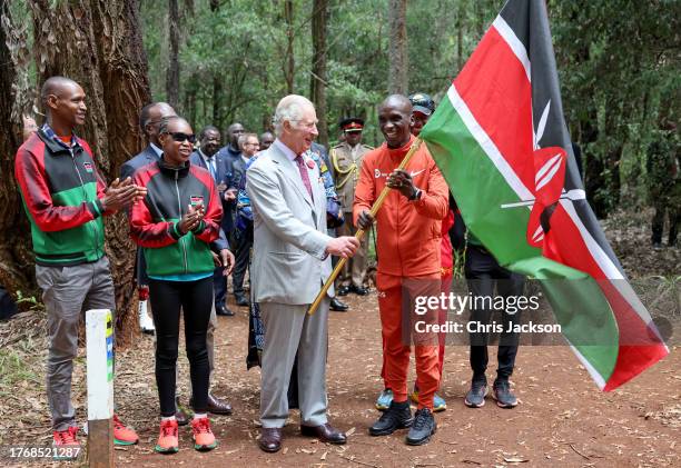 King Charles III with Kenyan marathon runner Eliud Kipchoge , as they flag off to start a 15km "Run for Nature" event during a visit to Karura urban...