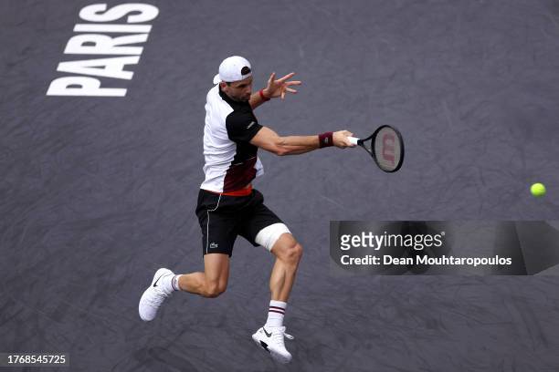 Grigor Dimitrov of Bulgaria returns a forehand in his match against Daniil Medvedev of Russia during Day Three of the Rolex Paris Masters ATP Masters...