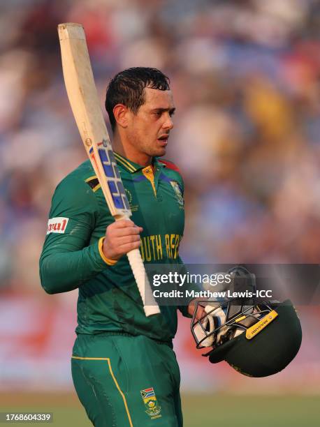 Quinton de Kock of South Africa makes their way off after being dismissed for 114 during the ICC Men's Cricket World Cup India 2023 between New...