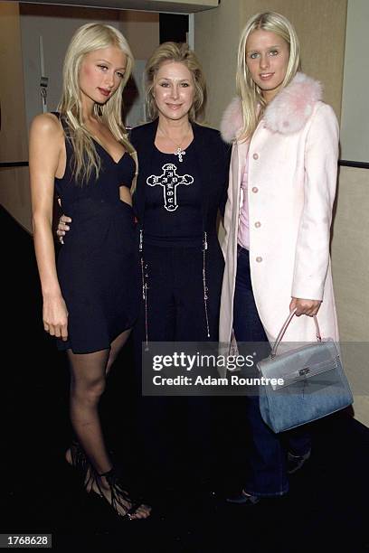 Paris, Kathy and Nicky Hilton attend the show for the Lloyd Klein Fall/Winter 2003 Collection at the Theater in Bryant Park during the Mercedes-Benz...