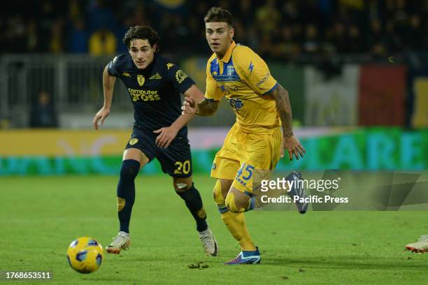 Enzo Barrenechea of Frosinone Calcio competes for the ball with Matteo Cancellieri of Empoli FC during the Serie A match between Frosinone Calcio vs...