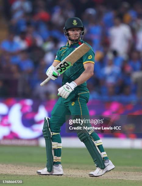 David Miller of South Africa celebrates their half century during the ICC Men's Cricket World Cup India 2023 between New Zealand and South Africa at...