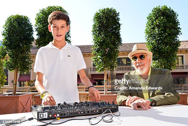 Music producer Lou Adler and his son Oscar Adler attend the Team Maria benefit for Best Buddies at Montage Beverly Hills on August 18, 2013 in...