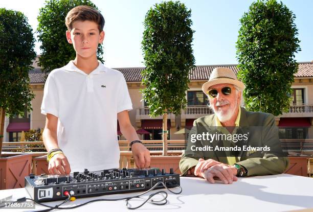 Music producer Lou Adler and his son Oscar Adler attend the Team Maria benefit for Best Buddies at Montage Beverly Hills on August 18, 2013 in...