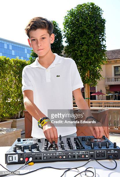 Oscar Adler spins records at the Team Maria benefit for Best Buddies at Montage Beverly Hills on August 18, 2013 in Beverly Hills, California.