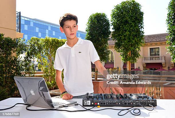 Oscar Adler spins records at the Team Maria benefit for Best Buddies at Montage Beverly Hills on August 18, 2013 in Beverly Hills, California.