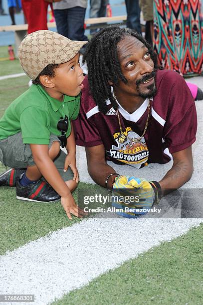 Recording artist Snoop Dogg and actor Elias Washington attend the 1st Annual Athletes VS Cancer Celebrity Flag Football Game on August 18, 2013 in...