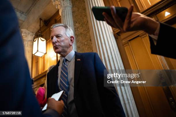 Sen. Tommy Tuberville speaks to reporters on his way to a closed-door lunch meeting with Senate Republicans at the U.S. Capitol November 7, 2023 in...