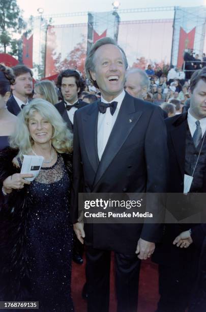 Portia Rebecca Crockett and Peter Fonda attend the 70th Academy Awards at the Shrine Auditorium in Los Angeles, California, on March 23, 1998.