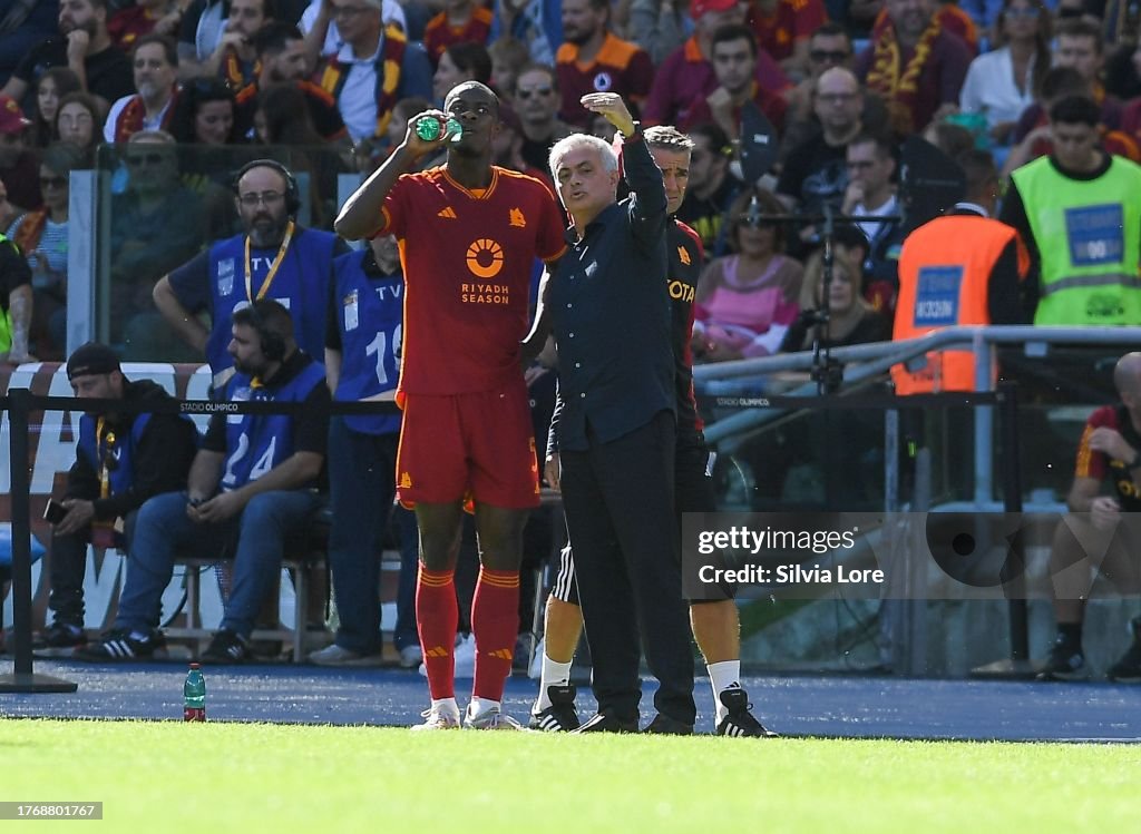 As Roma Coach Jose Mourinho head coach of AS Roma gives instructions to Evan Ndicka ...