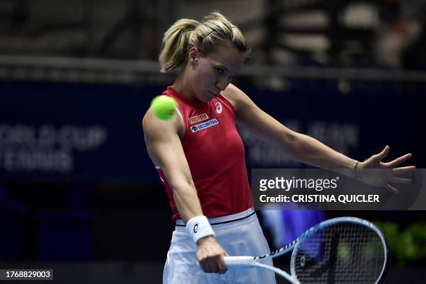 Switzerland's Viktorija Golubic returns to Czech Republic's Marie Bouzkova during the group stage group A tennis match between Switzerland and Czech...