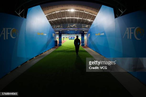 Colin Bell, head coach of South Korea, enters the field prior to the AFC Women's Asian Olympic Qualifier Round 2 Group B match between China and...