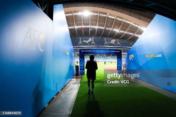 Head coach Shui Qingxia of China enters the field prior to the AFC Women's Asian Olympic Qualifier Round 2 Group B match between China and South...