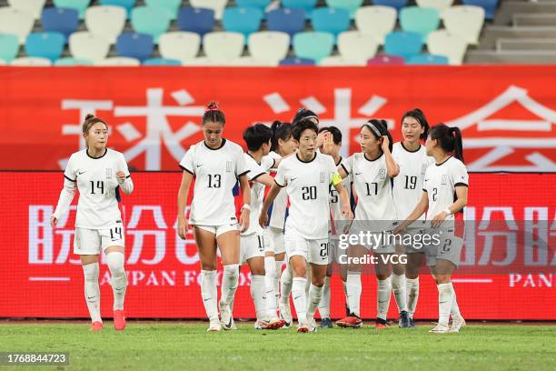 Shim Seo-yeon of South Korea celebrates with team mates after scoring her team's first goal during the AFC Women's Asian Olympic Qualifier Round 2...