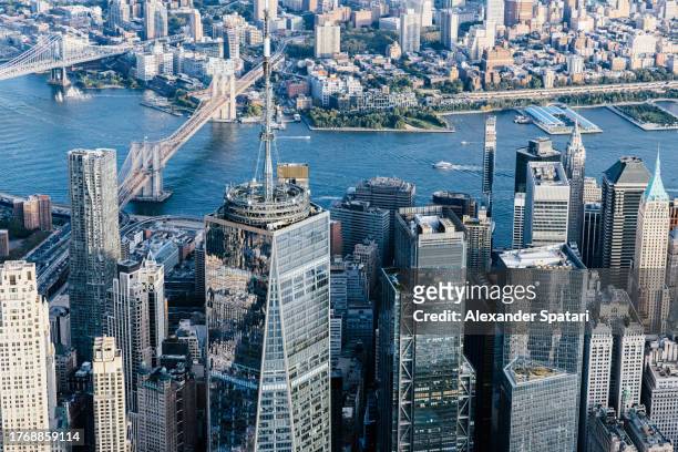 one world trade center and manhattan downtown seen from helicopter, new york city, usa - new york vacation rooftop stock pictures, royalty-free photos & images