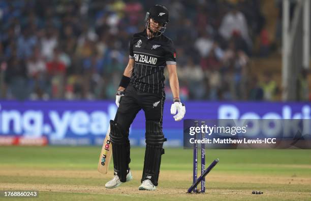 Mitch Santner of New Zealand makes their way off after being dismissed during the ICC Men's Cricket World Cup India 2023 between New Zealand and...