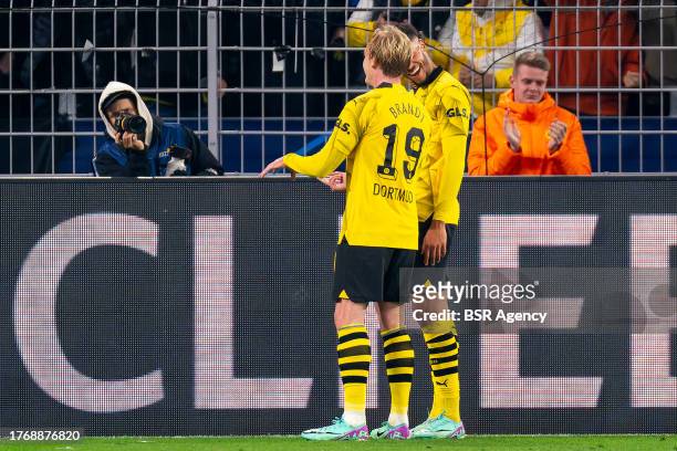Julian Brandt of Borussia Dortmund celebrates after scoring the team's second goal with Felix Nmecha of Borussia Dortmund during the UEFA Champions...