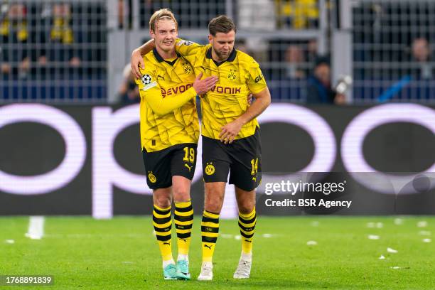 Julian Brandt of Borussia Dortmund celebrates after scoring the team's second goal with Niclas Fullkrug of Borussia Dortmund during the UEFA...