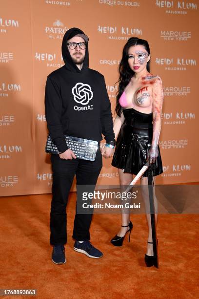 Devin Finzer and Yu-Chi Lyra Kuo attend Heidi Klum's 22nd Annual Halloween Party presented by Patron El Alto at Marquee on October 31, 2023 in New...