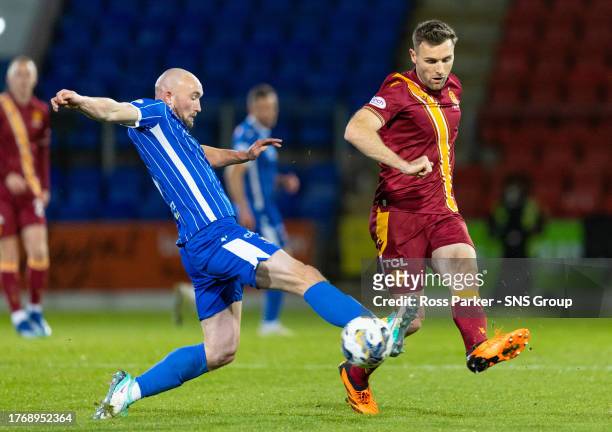 St Johnstone's Chris Kane and Motherwell's Stephen O'Donnell in action during a cinch Premiership match between St Johnstone and Motherwell at...